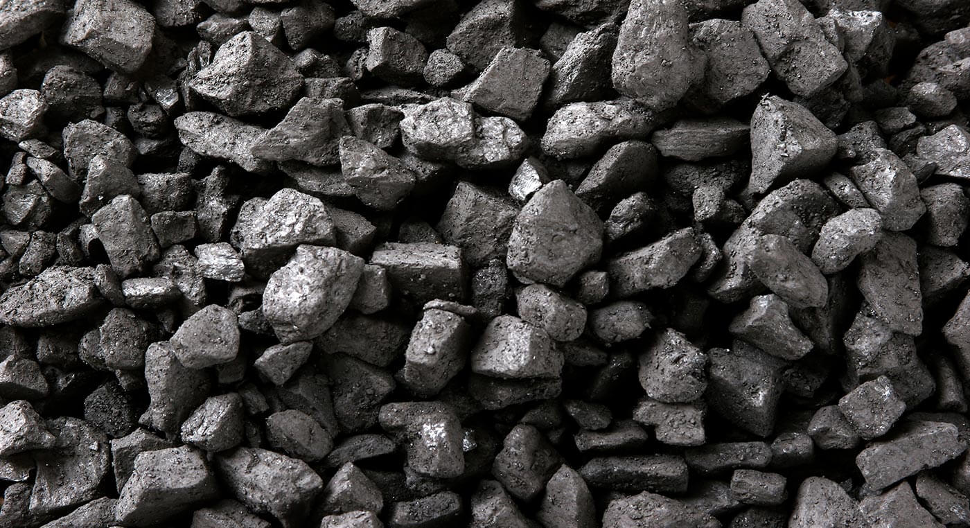 Dagbrott med dumprar i drift